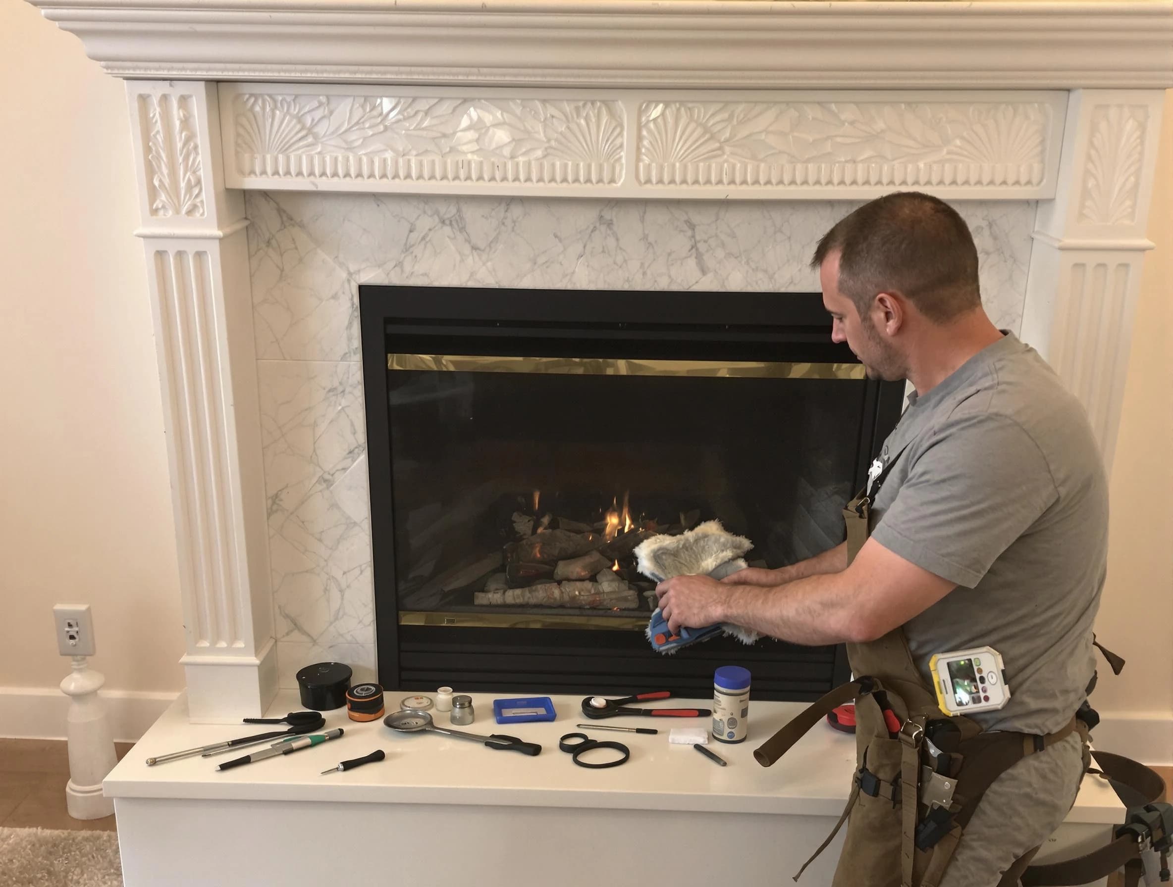 Powder Springs Chimney Sweep performing fireplace maintenance in Powder Springs, GA